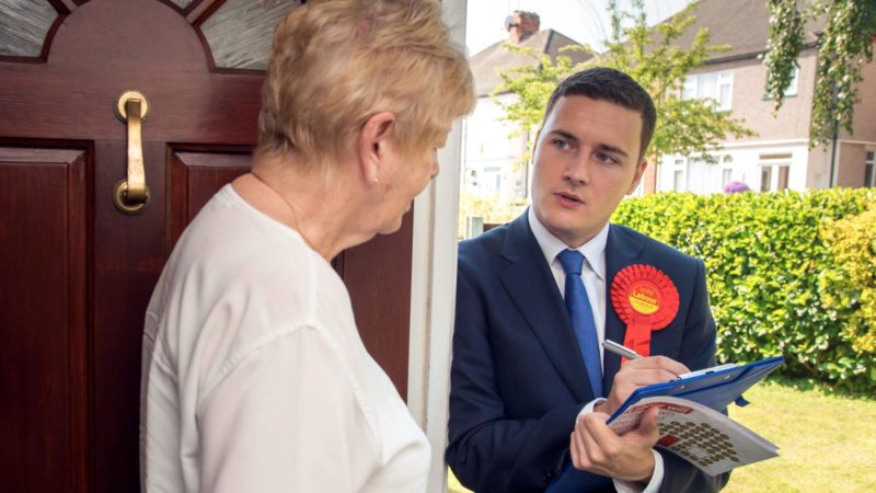 Wes visiting a local resident